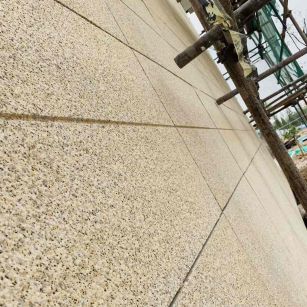 新余 黄金麻花岗岩荔枝面外墙干挂石材效果示例