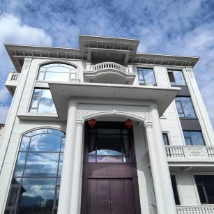 新余白麻别墅外墙干挂石材效果示例