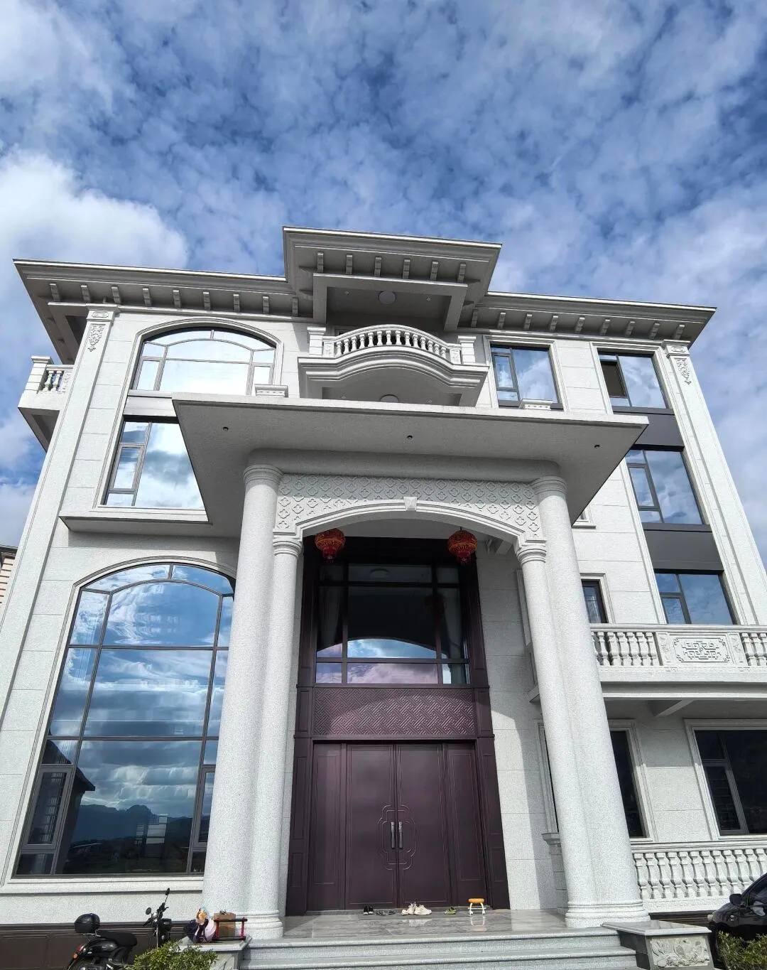 新余白麻别墅外墙干挂石材效果示例