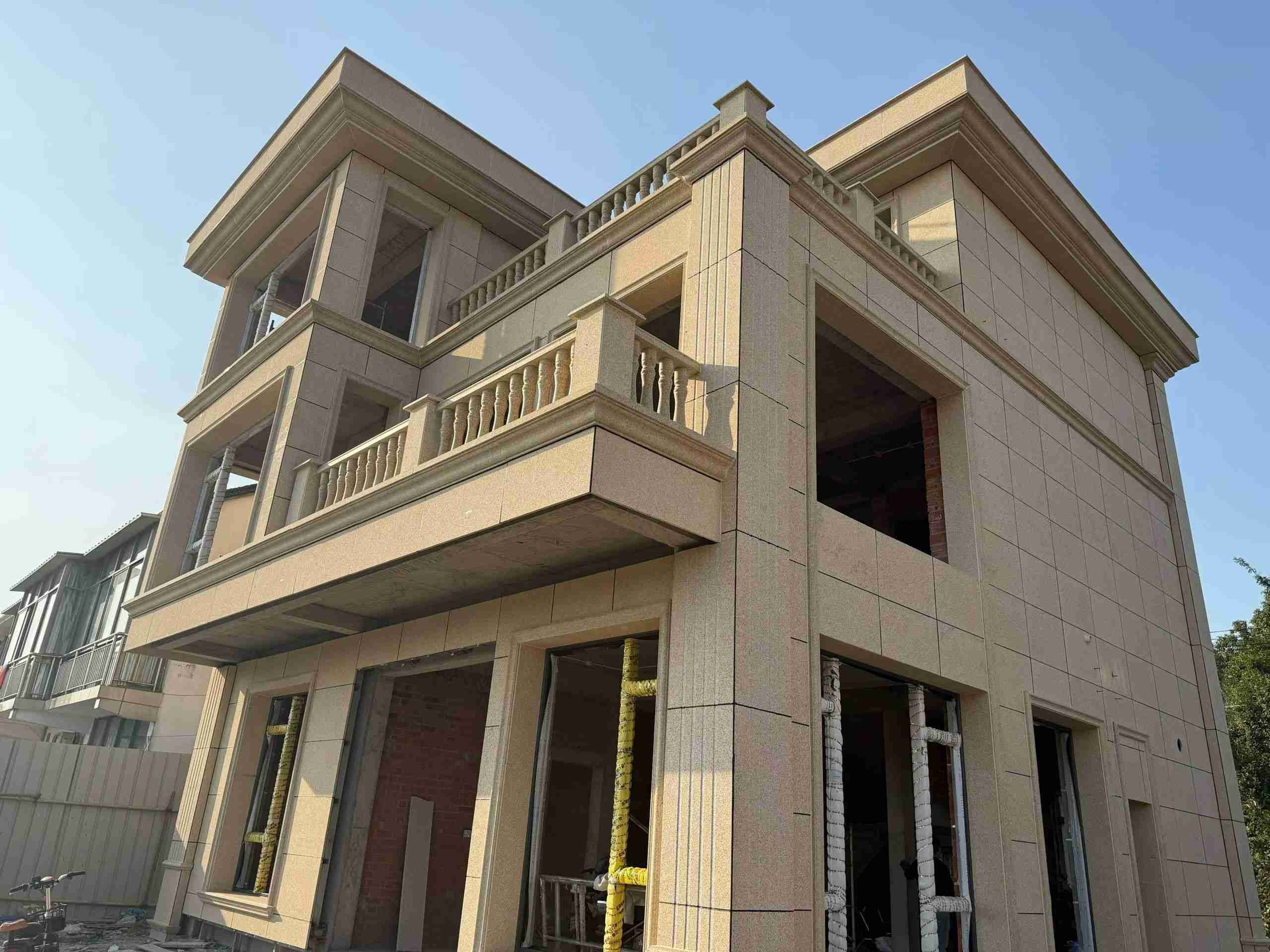 新余 黄金麻花岗岩石材荔枝面外墙干挂效果展示